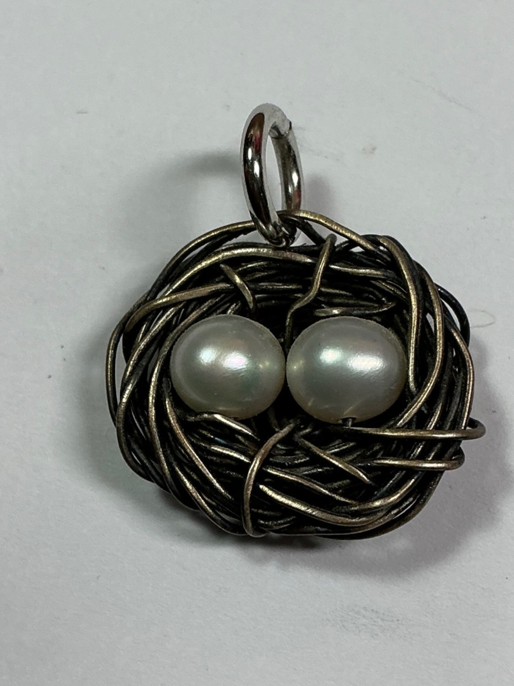 Sterling Silver Wire Wrapped Bird’s Nest Pendant W/ 2 white pearls “ eggs “ 3/4”